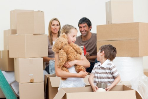 Carefully packed boxes and furniture ready for flat removals in Perivale